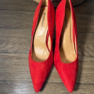 Marbella Red heels size 10M. Condition is used.